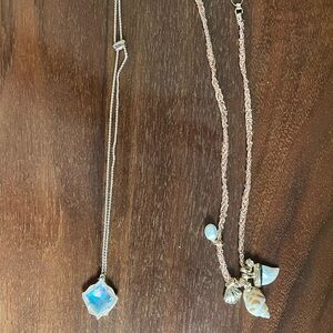 Kendra Scott Necklaces (2) iridescent pendant, shells. Both are gold.